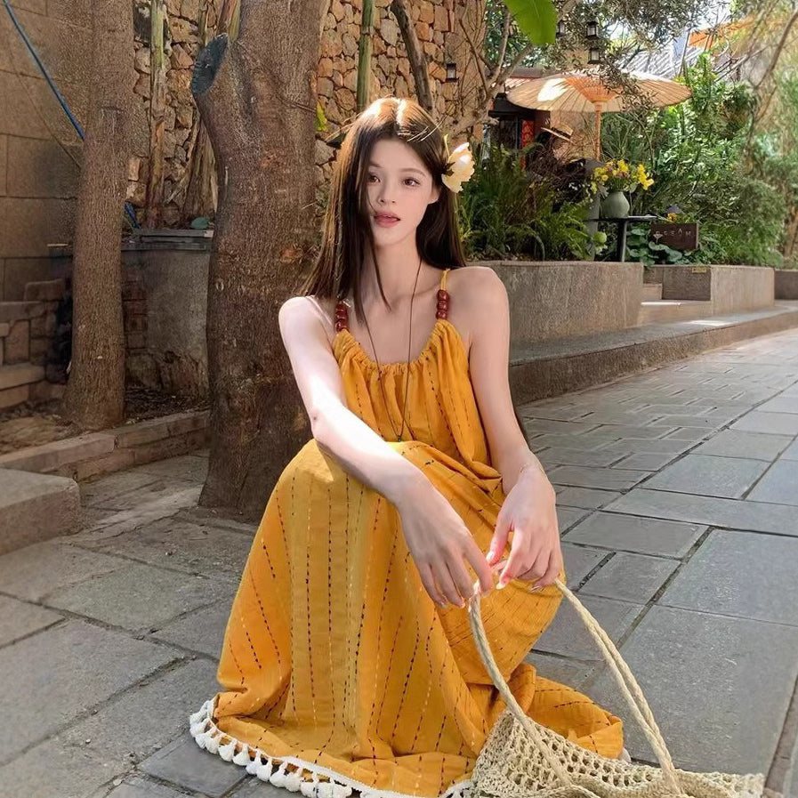 【ワンピース】ビーチリゾート風 エレガントなリラックス感 フリンジ付き ノースリーブワンピース