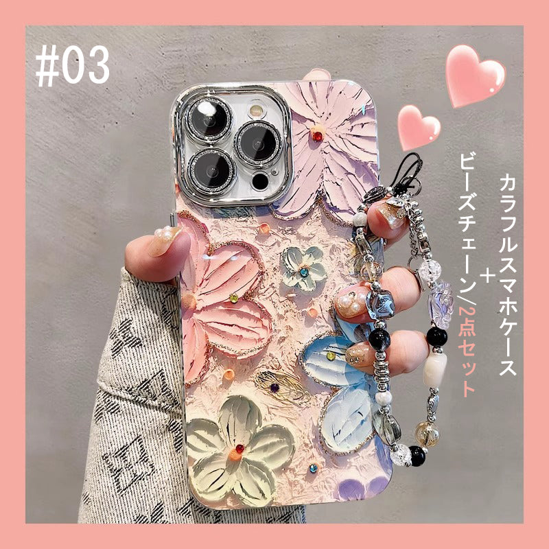 【グッズ】iPhone 16 Pro Max / 15 Pro / 13 / 13 PM  用 ブルーライトカット 油絵フラワー 韓国風 レディース 全面保護 レンズカバー付き 高級感 ストラップ付き 新作 スマホケース