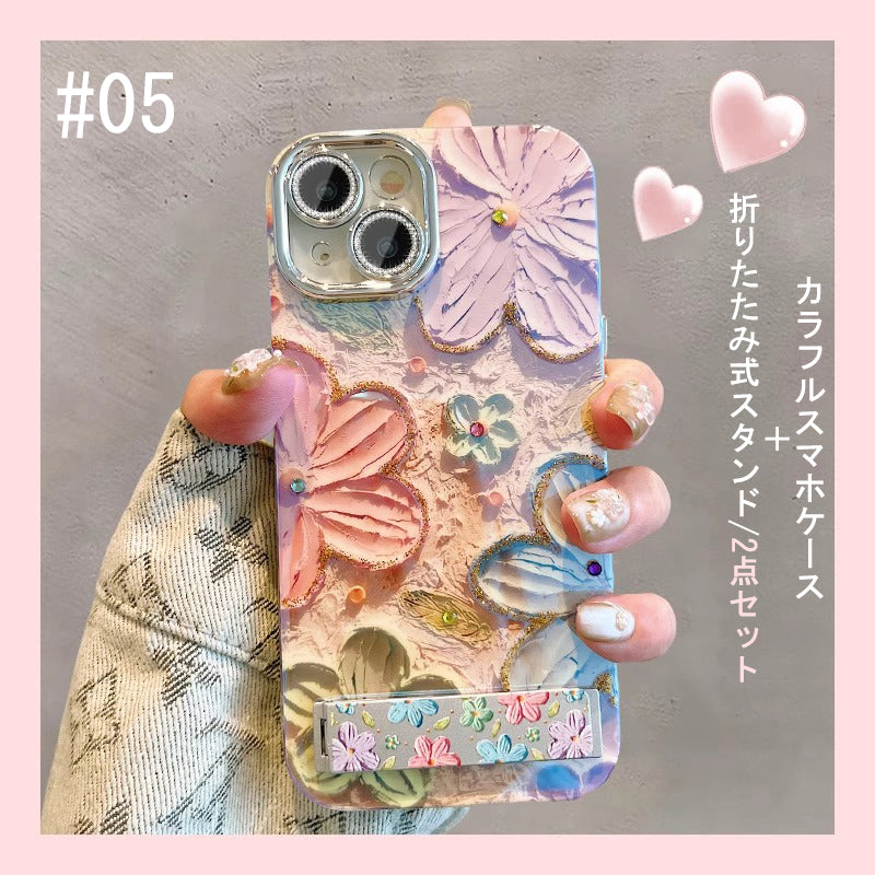 【グッズ】iPhone 16 Pro Max / 15 Pro / 13 / 13 PM  用 ブルーライトカット 油絵フラワー 韓国風 レディース 全面保護 レンズカバー付き 高級感 ストラップ付き 新作 スマホケース