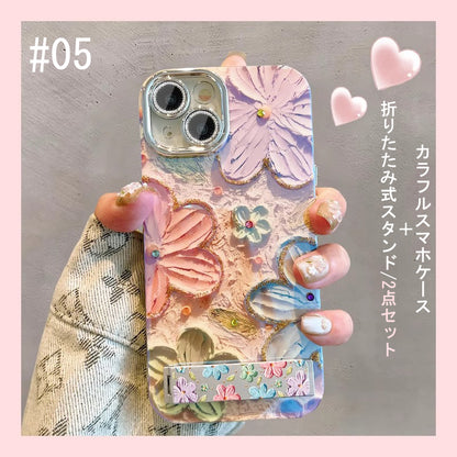 【グッズ】iPhone 16 Pro Max / 15 Pro / 13 / 13 PM  用 ブルーライトカット 油絵フラワー 韓国風 レディース 全面保護 レンズカバー付き 高級感 ストラップ付き 新作 スマホケース