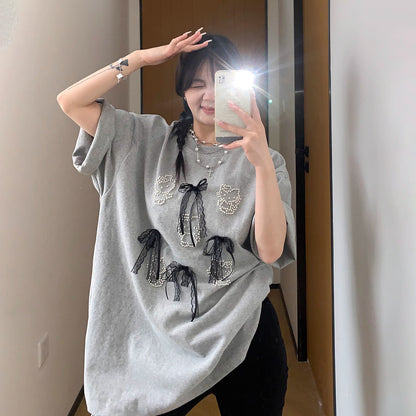 【トップス】【10～15日内発送】夏新作 個性派デザイン レースリボン＆パール付き 綿100％ 半袖Tシャツ【FCシリーズ】