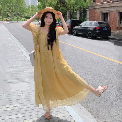 【ワンピース】イエロー ロングワンピース 夏 ゆったり バックシャン リボンデザイン 体型カバー リゾートドレス【JZシリーズ】