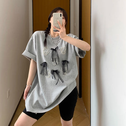 【トップス】【10～15日内発送】夏新作 個性派デザイン レースリボン＆パール付き 綿100％ 半袖Tシャツ【FCシリーズ】