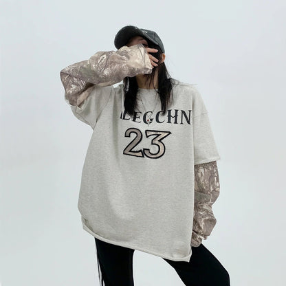 【トップス】春秋 フェイクレイヤード 刺繍 長袖 Ｔシャツ【FCシリーズ】