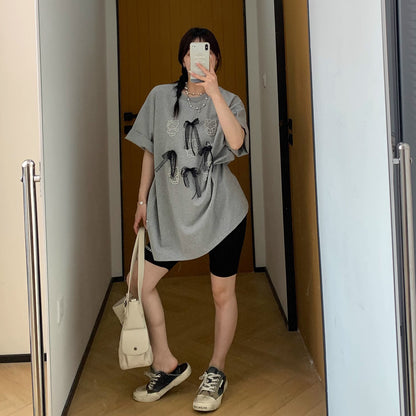 【トップス】【10～15日内発送】夏新作 個性派デザイン レースリボン＆パール付き 綿100％ 半袖Tシャツ【FCシリーズ】