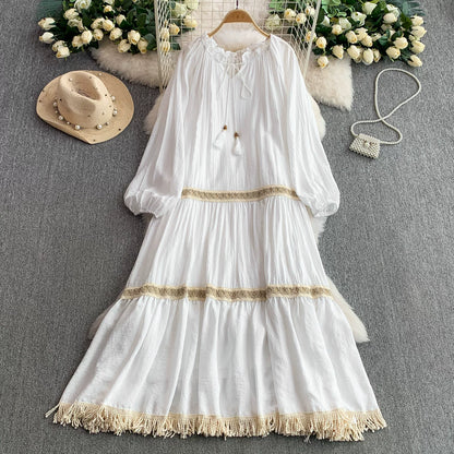 【ワンピース】一目惚れ確定！リゾート感たっぷり 民族風ロングドレス｜タッセル＆フレア袖 長袖ワンピース【SHシリーズ】